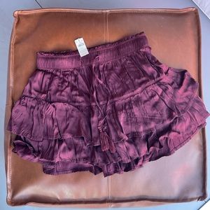 Aerie Burgundy tiered ruffle mini skirt.